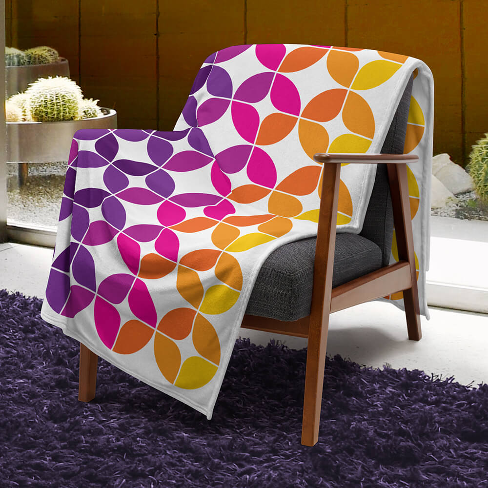 Mid Century Modern Purple Orange StarChips 60" x 80" Throw Blanket in a bedroom