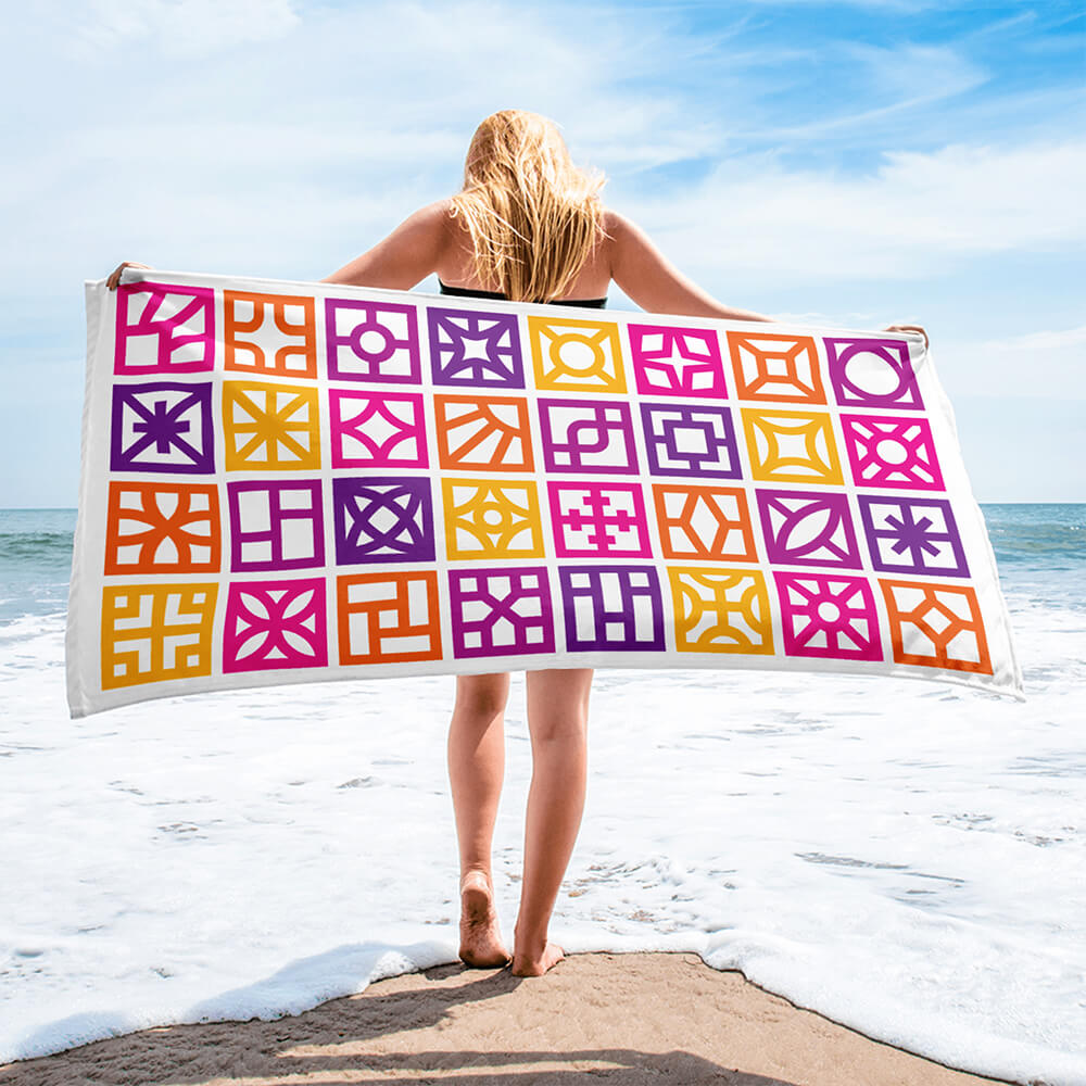 Mid Century Modern Orange Breeze Blocks Beach & Pool Towel held by a girl at the beach